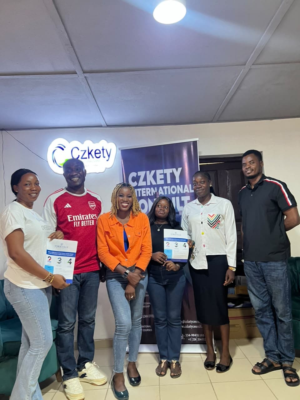 Czkety team with a Yorkville University partner representative
